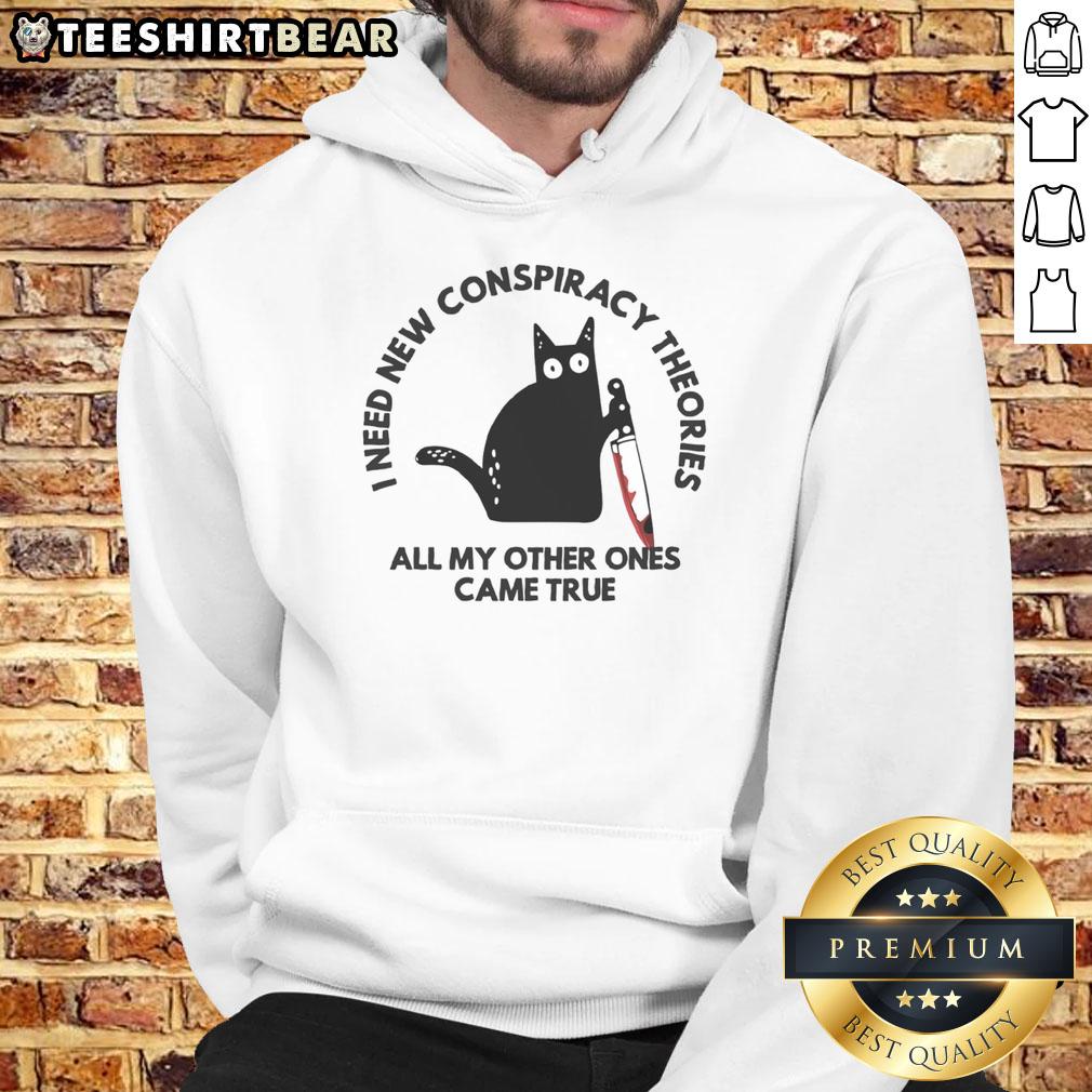 Funny cat hoodie with the text I need new conspiracy theories, all my other ones came true, perfect for cat lovers.