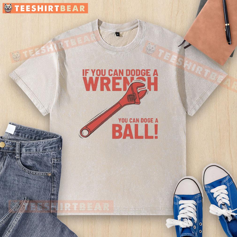 Funny 'If You Can Dodge A Wrench, You Can Dodge A Ball' washed t-shirt design showcasing humor and playful sports theme.