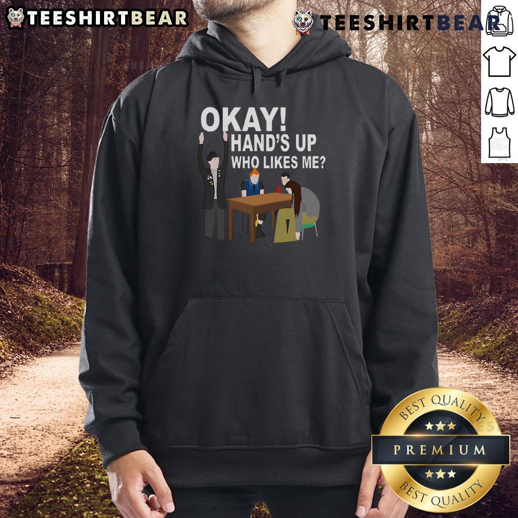 Alt Text: Funny Okay Hands Up Who Likes Me Hoodie featuring a playful design perfect for casual wear and humor lovers.