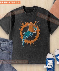 Funny Paper Bag Dolphin design on a washed t-shirt, perfect for ocean lovers and quirky fashion enthusiasts.