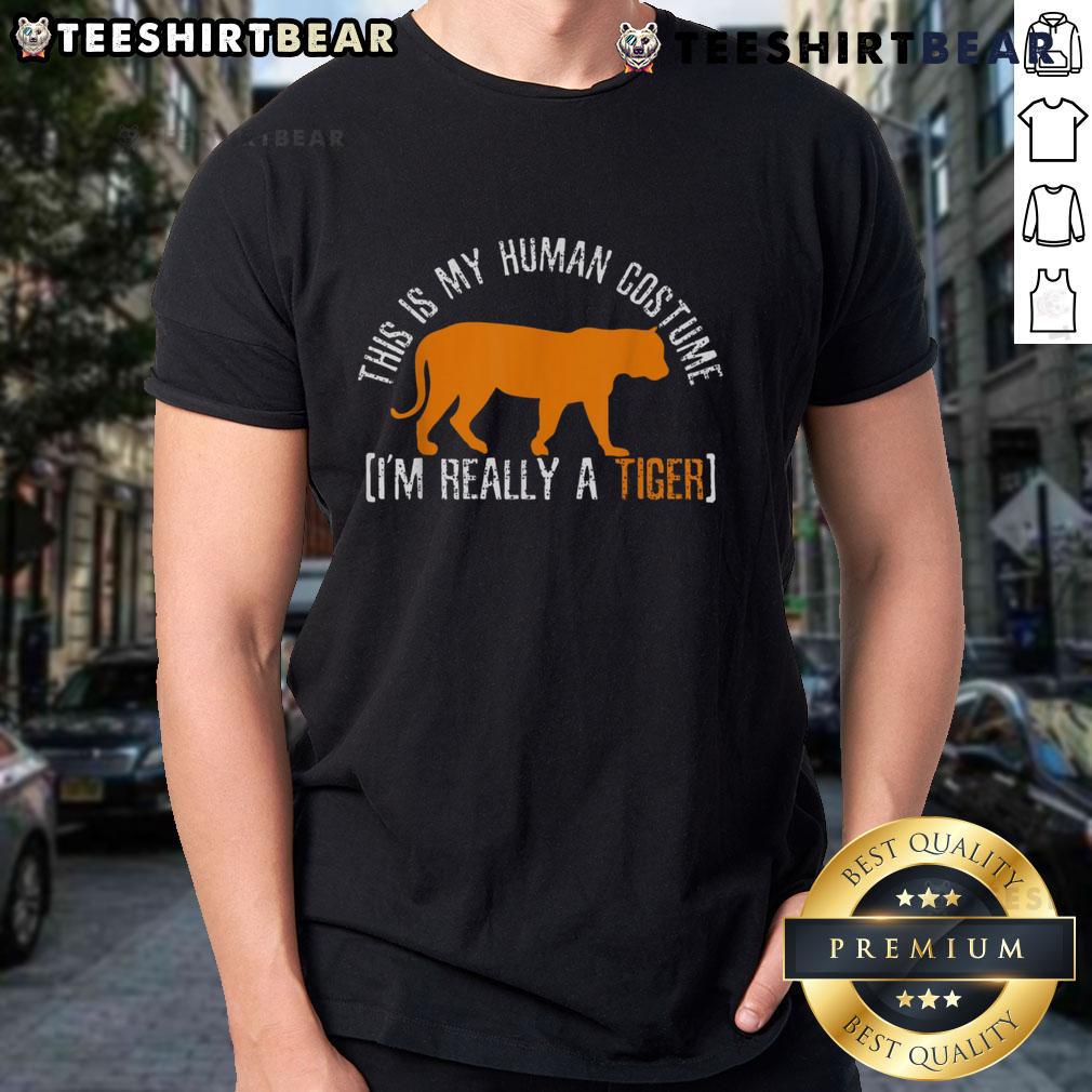 Alt Text: Funny This Is My Human Costume, Im Really A Tiger T-shirt design featuring a playful tiger graphic.