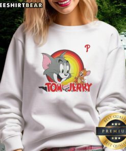 Good Tom and Jerry X Philadelphia Phillies sweatshirt featuring vibrant cartoon graphics and team colors.