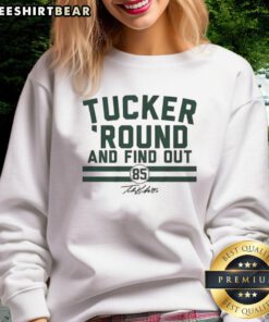Good Tucker Kraft Green Bay Packers sweatshirt featuring 'Round and Find Out' design for fans and supporters.