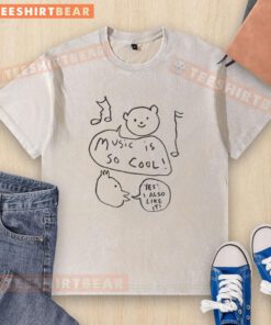 Stylish washed t-shirt featuring 'Nice Music Is Cool Yes I Also Like It' graphic design in vibrant colors.