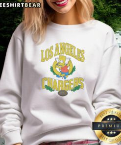 Bart Simpson wearing a Los Angeles Chargers sweatshirt in a vibrant design, perfect for NFL fans and The Simpsons lovers.