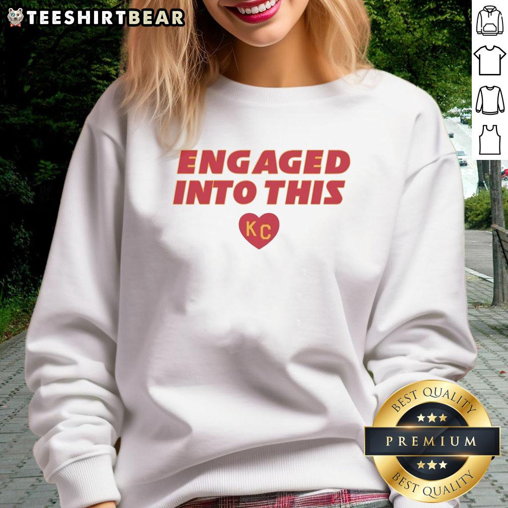 Official engaged sweatshirt featuring KC Travis Kelce and Taylor designs, perfect for fans celebrating their love.