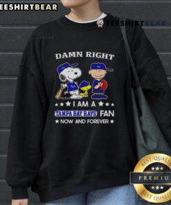 Top Damn Right I Am A Rays Fan Now And Forever sweatshirt featuring Snoopy and Charlie Brown in vibrant colors.
