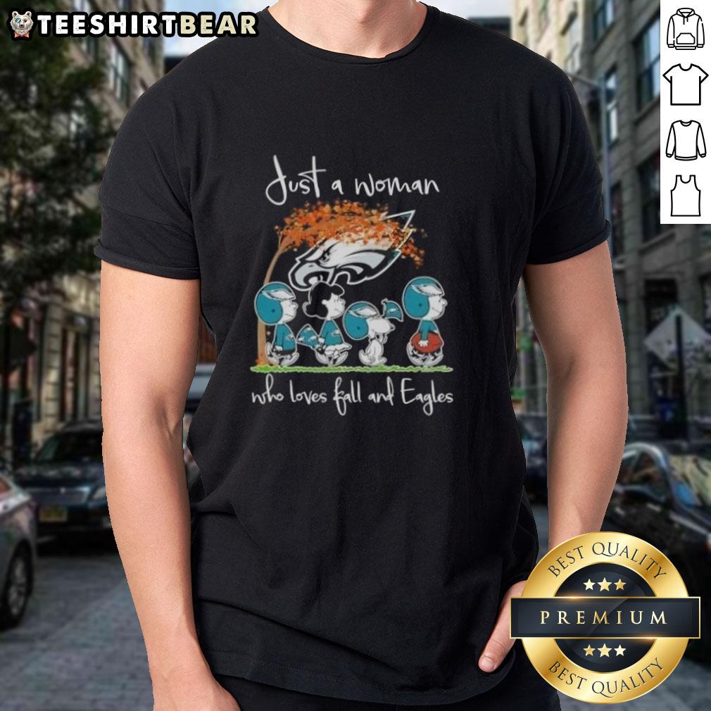 Top Peanuts Just A Woman Who Loves Fall and Philadelphia Eagles Football T-Shirt, perfect for autumn sports fans.