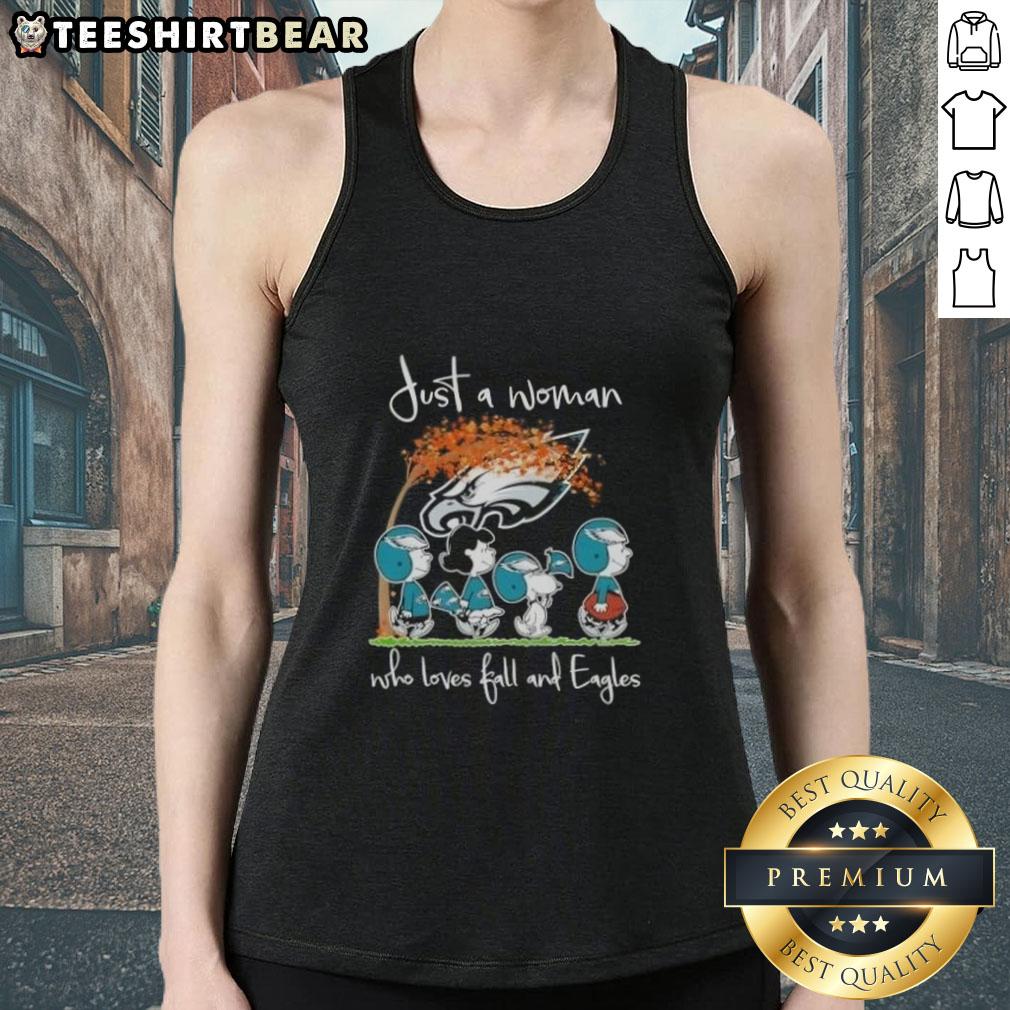 Just a woman who loves fall and Philadelphia Eagles football wearing a stylish tank top featuring peanuts design.