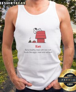 Person wearing a tank top featuring Top Peanuts and American Red Cross, promoting iron-rich meals like eggs and spinach.