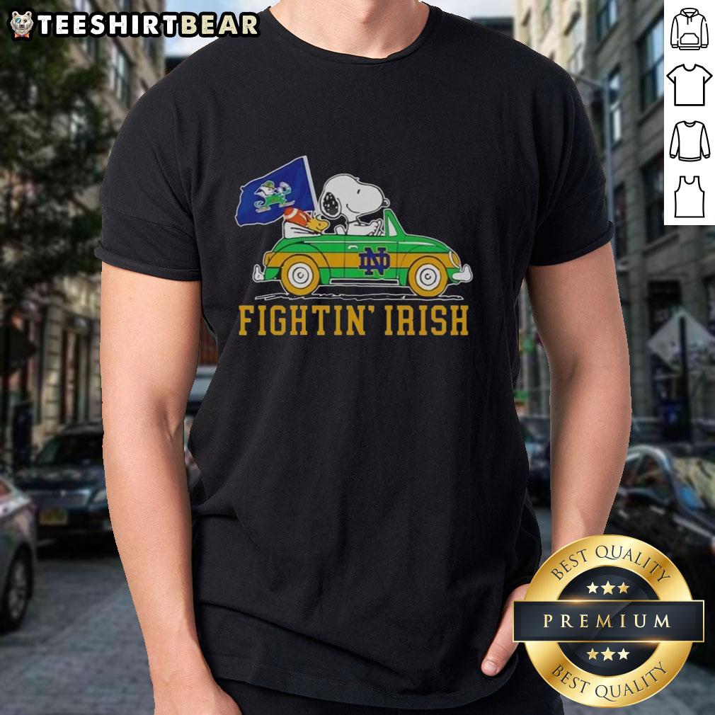 Alt Text: Top Snoopy and Woodstock driving a car on a Notre Dame Fighting Irish T-Shirt design, perfect for fans.