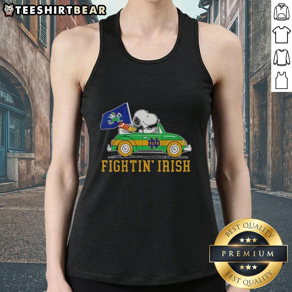 Alt Text: Snoopy and Woodstock driving a car on a Notre Dame Fighting Irish tank top, showcasing a fun cartoon design.