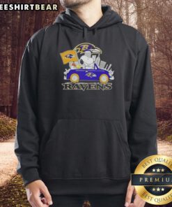 Top Snoopy driving a car in a Baltimore Ravens football hoodie, showcasing team spirit and fun style.