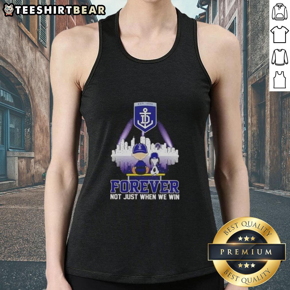 Alt Text: Top Snoopy X Charlie Brown Fremantle Dockers 'Forever, Not Just When We Win' Skyline Tank Top displayed on a mannequin.