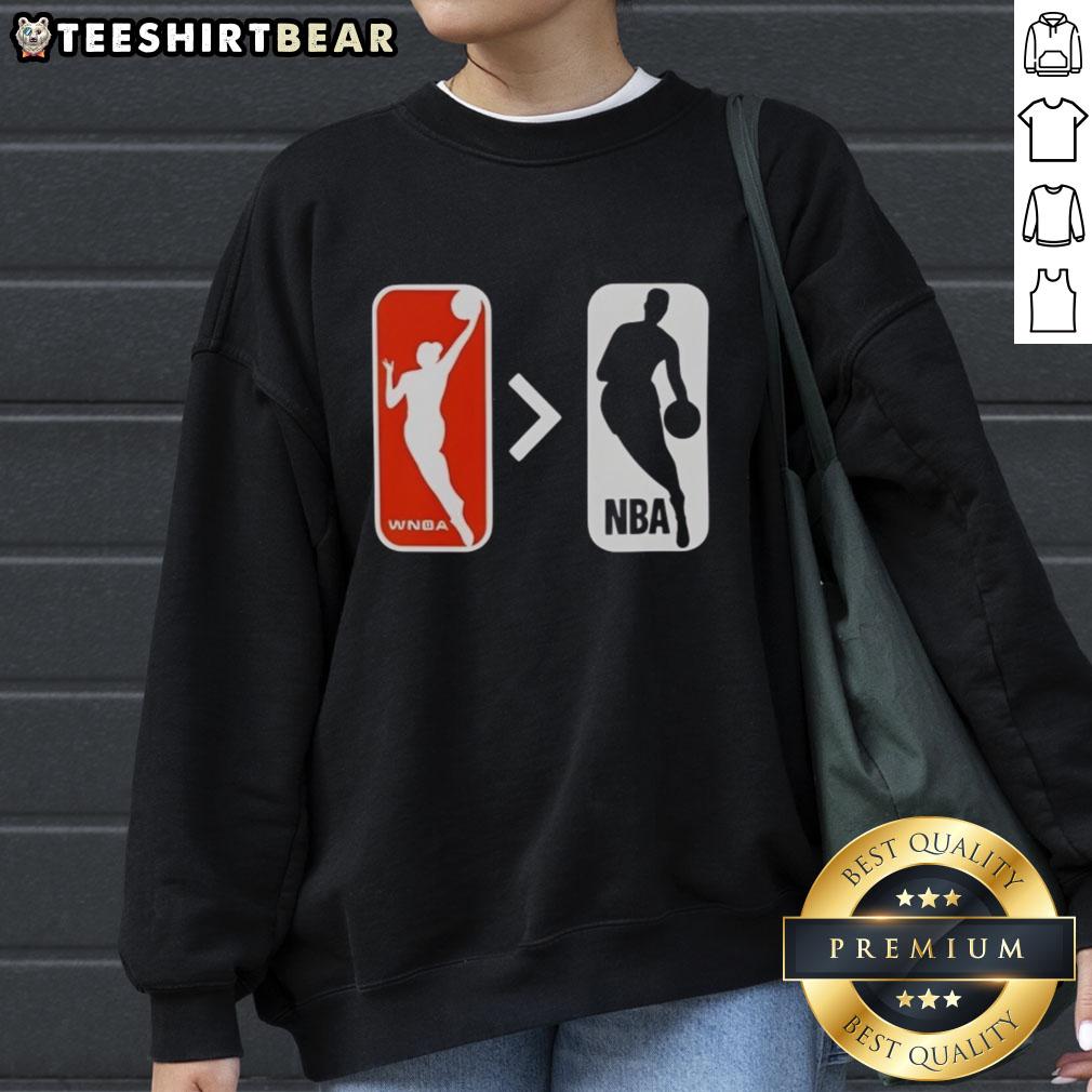 Top WNBA is Greater Than NBA sweatshirt featuring bold text design, perfect for basketball fans and sports enthusiasts.