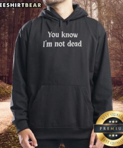 Top You Know I'm Not Dead Hoodie in black, featuring bold text design, perfect for casual wear and making a statement.