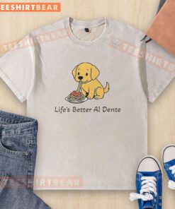 Adorable dog meme on a washed t-shirt featuring the phrase 'Life's Better Al Dente' in playful typography.