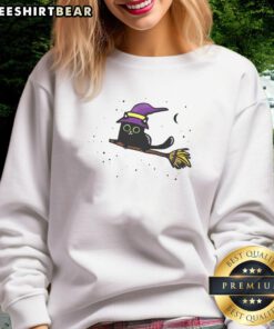 Cute witchy kitty Halloween sweatshirt featuring an adorable cat in a witch hat, perfect for festive fall wear.