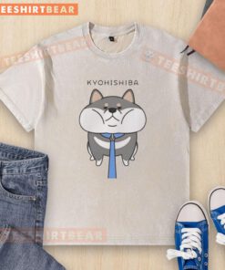 Cute Kyohishiba dog in a funny pose wearing a washed t-shirt, showcasing its adorable personality and playful spirit.