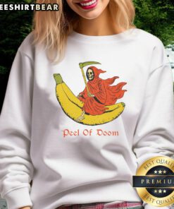 Funny The Reaper Banana Peel of Doom sweatshirt featuring a quirky design of a skeleton slipping on a banana peel.