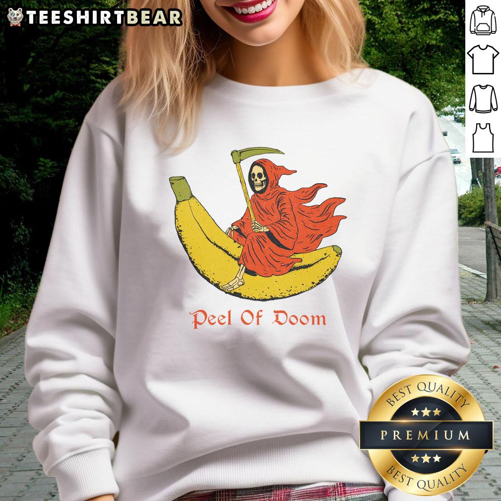 Funny The Reaper Banana Peel of Doom sweatshirt featuring a quirky design of a skeleton slipping on a banana peel.
