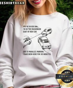 Funny sweatshirt with text 'You're in her DMs, I'm in the passenger seat' featuring a playful parallel parking theme.