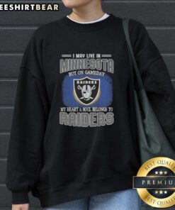 Alt Text: Cozy Raiders sweatshirt showcasing team pride for Minnesota fans on game day, blending warmth and team spirit.