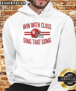 Indiana Hoosiers football fans celebrate a win in stylish helmets and hoodies, proudly singing 'That Song' together.