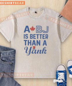 Nice A Bj Is Better Than A Yank Washed T-Shirt displayed on a mannequin in a trendy boutique, showcasing its stylish design.