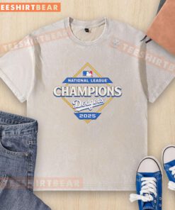 Alt Text: Official Los Angeles Dodgers 2025 National League Champions diamond logo on a washed t-shirt, showcasing team pride.