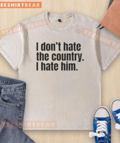Original 'I Don't Hate the Country, I Hate Him' washed t-shirt showcasing a bold graphic design for casual wear.