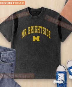 Premium Mr. Brightside Michigan Wolverines Football washed t-shirt in blue, perfect for fans showcasing team spirit.