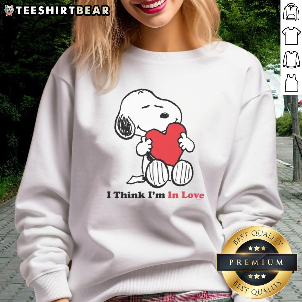 Pretty Snoopy I Think I'm In Love sweatshirt featuring a cute design of Snoopy with hearts, perfect for casual wear.