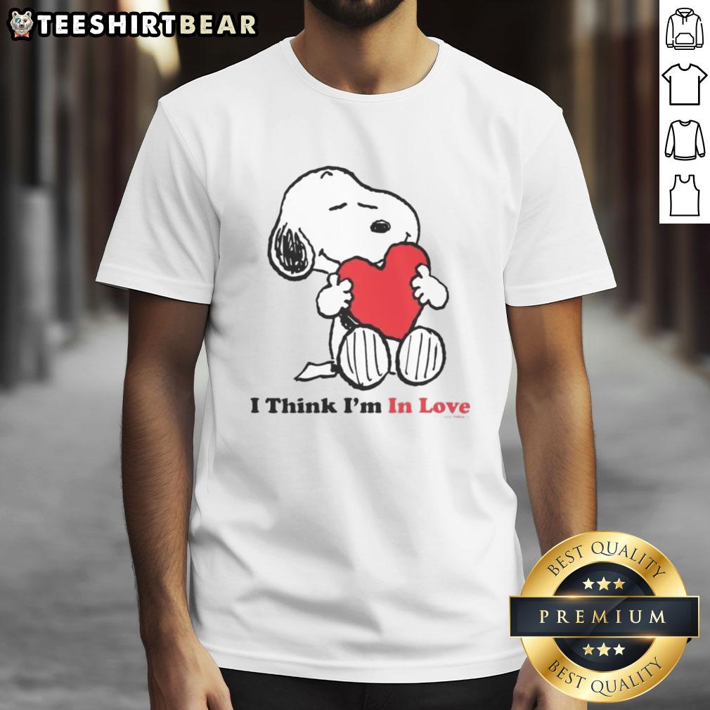 Alt Text: Cute Snoopy I Think I'm In Love T-Shirt featuring a playful design perfect for Peanuts fans and casual wear.