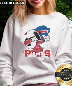 Alt Text: Top Buffalo Bills Snoopy dabbing on NFL football sweatshirt, perfect for fans and Peanuts lovers.