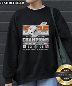 2025 Texas Longhorns Golden Hat Trophy Champions sweatshirt celebrating victory over Oklahoma Sooners.