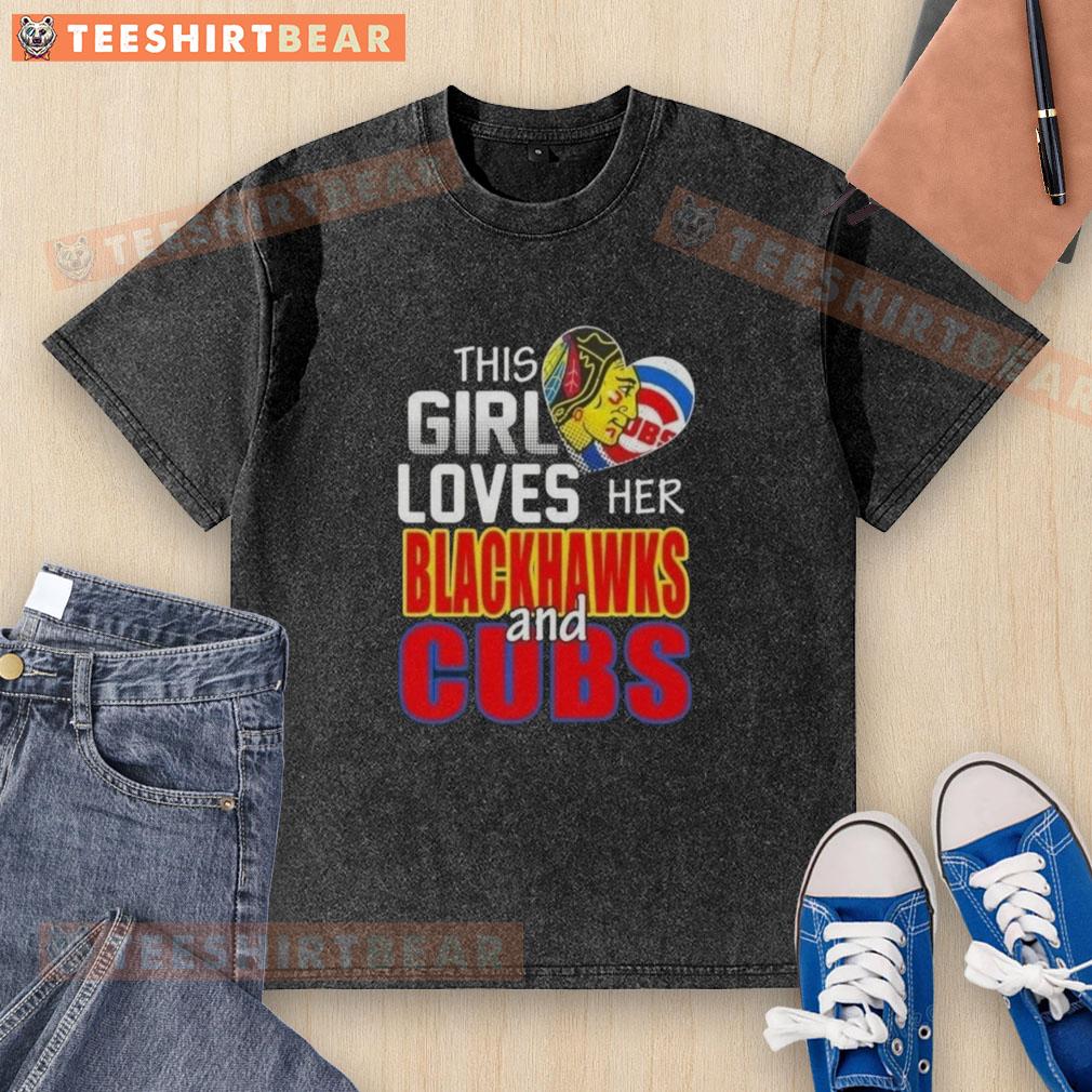 Alt Text: Girl wearing a washed black t-shirt showing love for Chicago sports, featuring Blackhawks and Cubs logos.