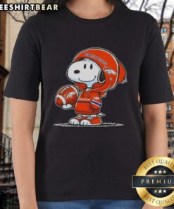 Premium Peanuts Snoopy in a Denver Broncos hoodie, smiling at fans on a ladies tee shirt.