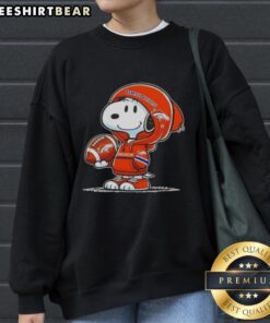 Premium Peanuts Snoopy in hoodie smiling at fans, showcasing Denver Broncos sweatshirt in vibrant colors.