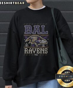 Awesome Baltimore Ravens holiday sweatshirt featuring the team's logo, perfect for fans celebrating the season.