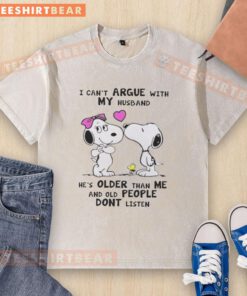 Cute Peanuts Snoopy t-shirt with 'I can't argue with my husband, he's older' design for humorous apparel.