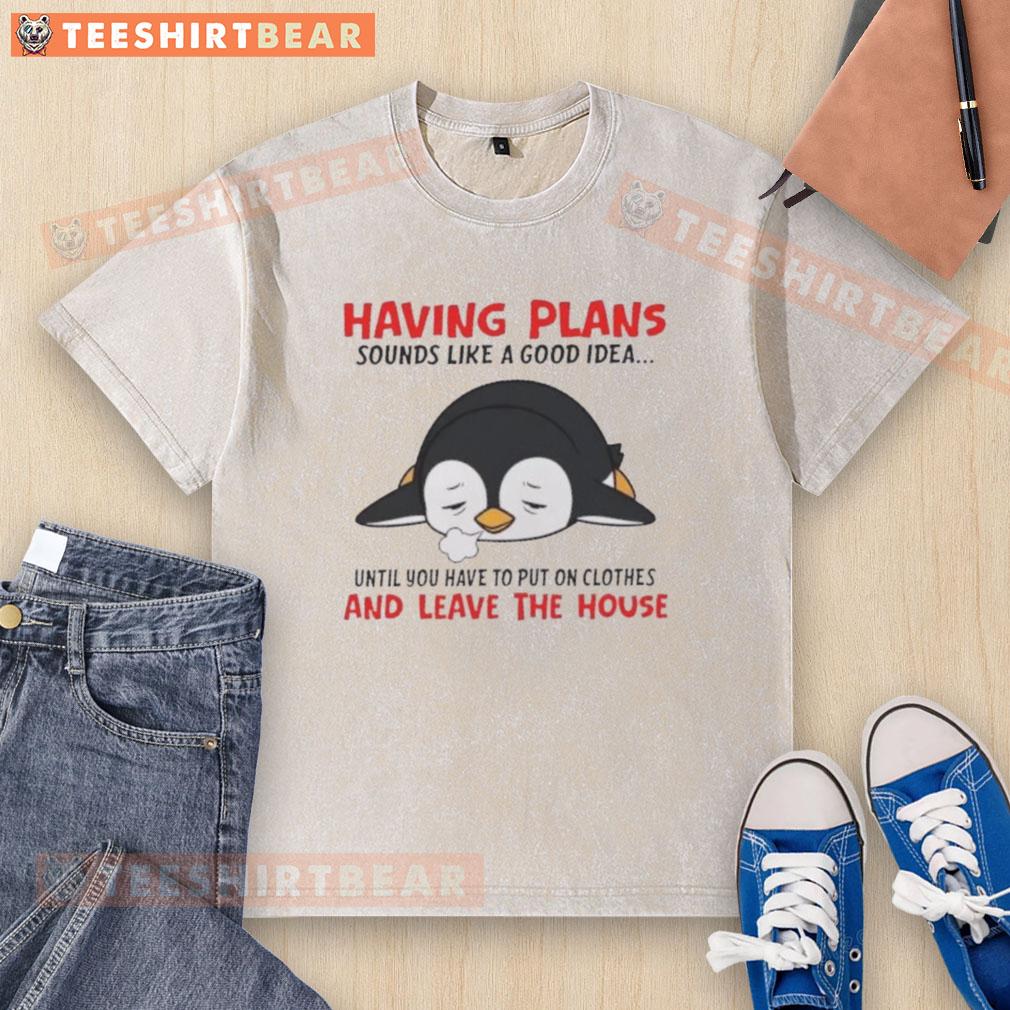 Cute penguin wearing a washed t-shirt, contemplating plans before leaving the house. A fun idea for penguin lovers!