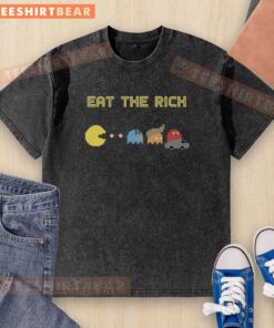 Funny Pacman Eat the Rich washed t-shirt featuring a playful design of Pacman devouring dollar signs.