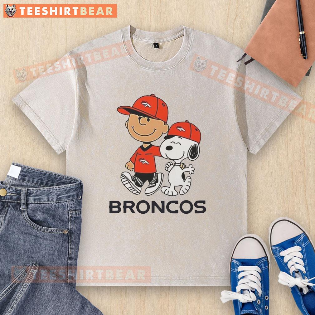 Good Denver Broncos NFL X Peanuts Snoopy and Charlie Brown washed t-shirt featuring vibrant team colors and playful design.