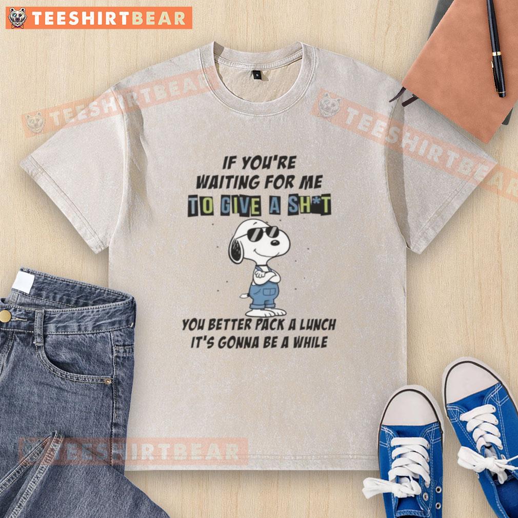 Funny washed t-shirt with text 'Good If You're Waiting For Me To Give A Sh*t, Pack A Lunch' for casual wear.