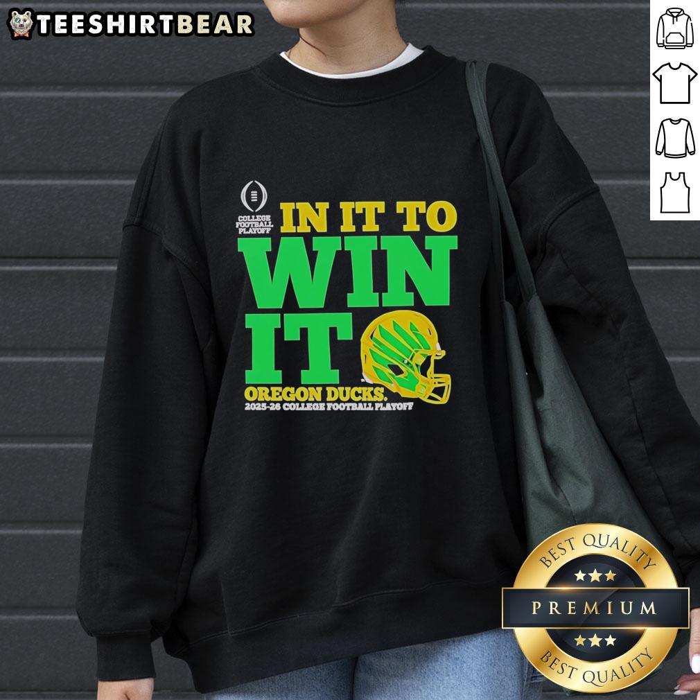 Good Oregon Ducks In It To Win It CFP 2025-26 helmet sweatshirt, showcasing team spirit and vibrant design for fans.