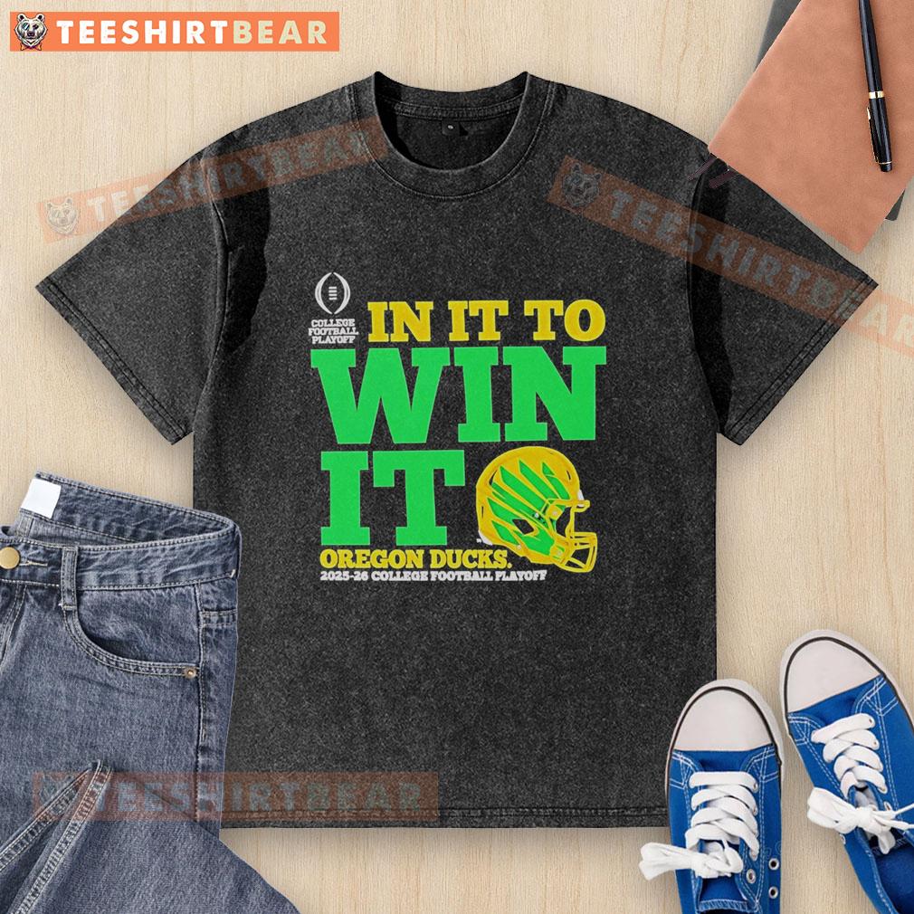 Good Oregon Ducks In It To Win It CFP 2025-26 helmet washed t-shirt featuring team colors and logo.