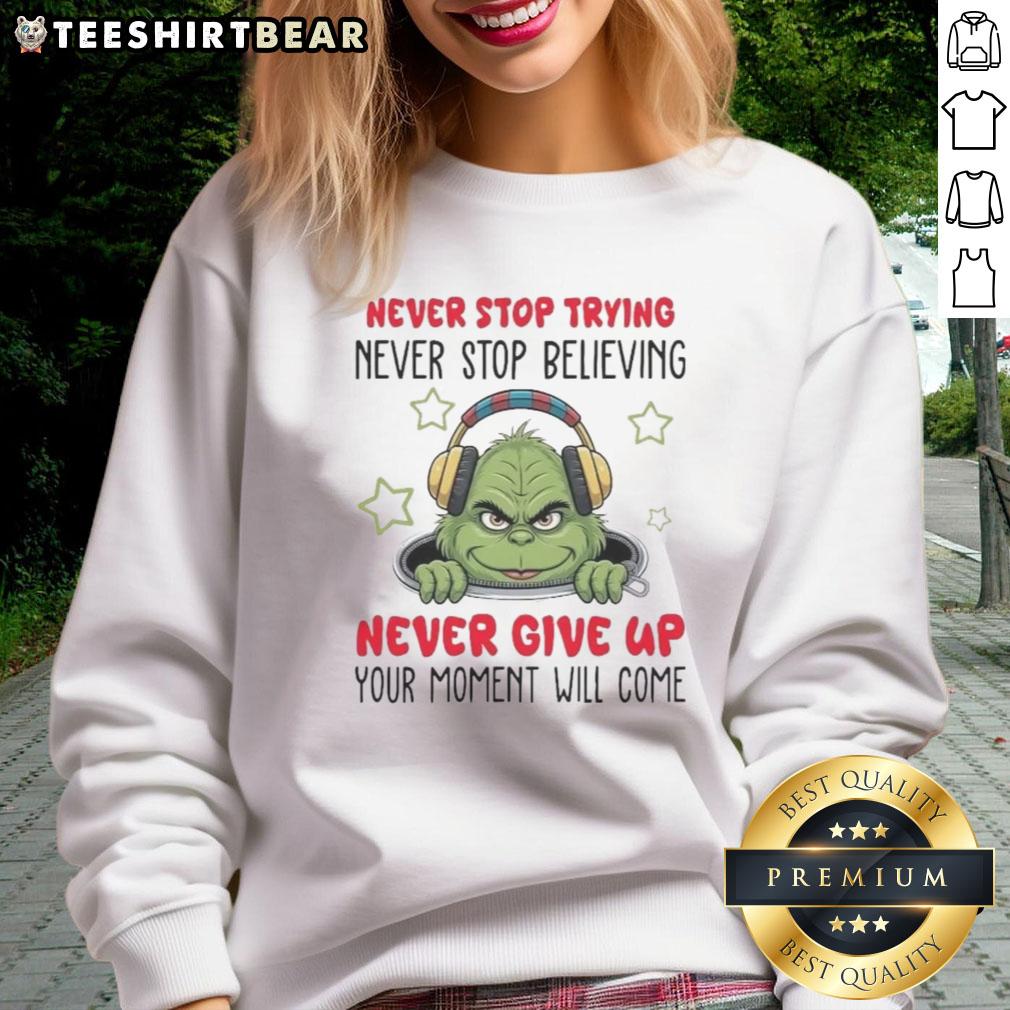 Cozy Nice Grinch sweatshirt with 'Never Stop Trying, Never Stop Believing' text, perfect for festive holiday cheer.