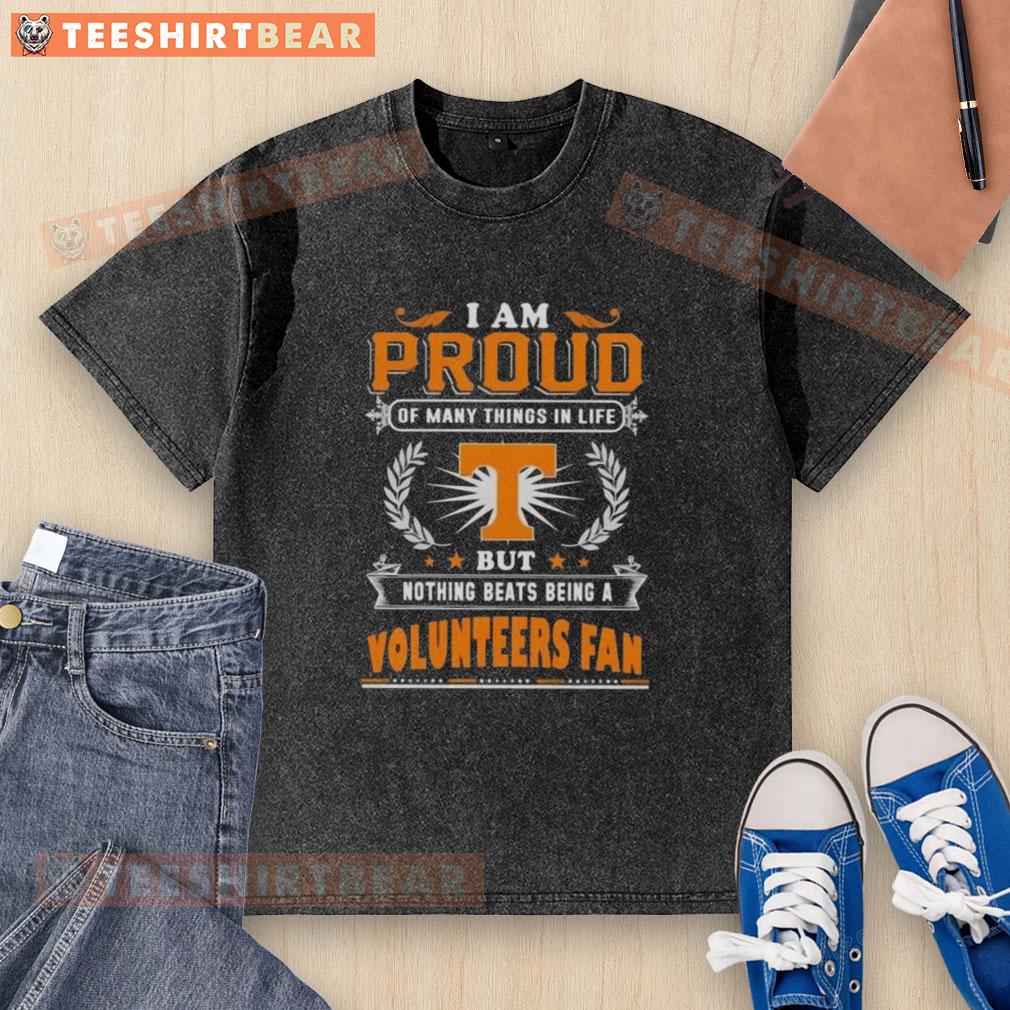 Alt Text: Proud Tennessee Volunteers fan wearing a washed t-shirt showcasing their love for the team and school spirit.