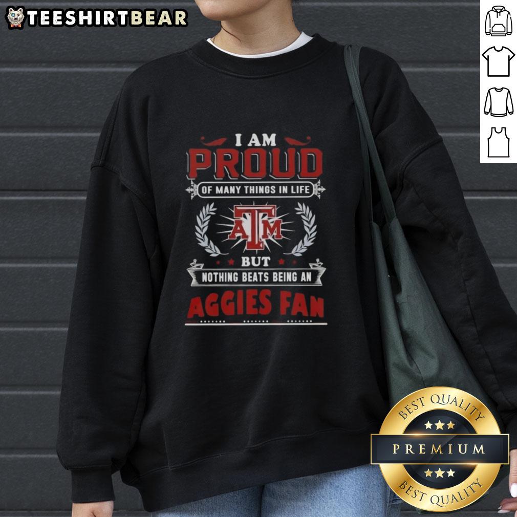 Alt Text: Texas A&M Aggies fan sweatshirt with 'Proud of Many Things, But Nothing Beats Being a Texas A&M Aggies Fan' slogan.